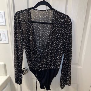 Black and floral bodysuit. Sm/med. bundles to save.